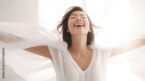 A beaming lady in a white t-shirt dress raises her arms with a relaxed smile, expressing her unbridled happiness against the pristine white backdrop. generative AI.