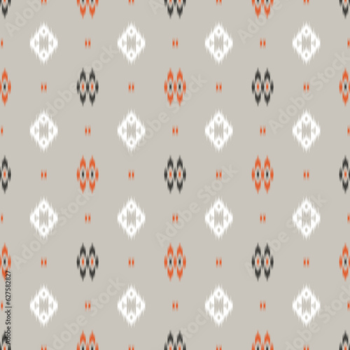 Colorful ikat seamless pattern on grey background 