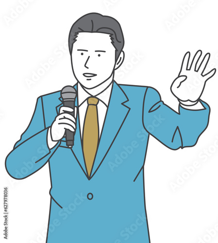 A man in a suit talking with a microphone