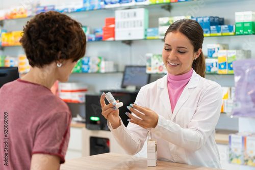 A female pharmacist talking with a female customer about a products choice