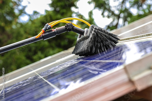 Gentle cleaning of photovoltaic modules with rainwater and soft brush