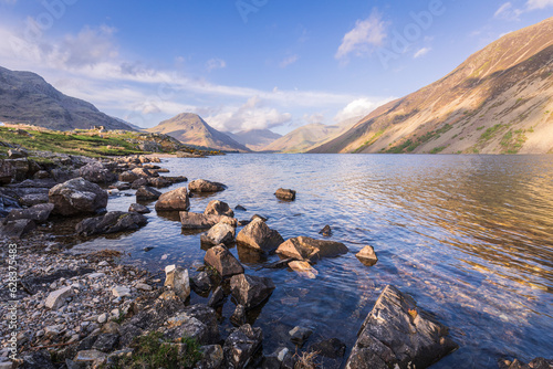 The vastness of Wastwater nestled in the Wasdale valley with scafell pike rising in the background, lake district Cumbria north east England