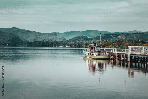 The view of the cruise and the Ullswater in the Lake District in overcast days
