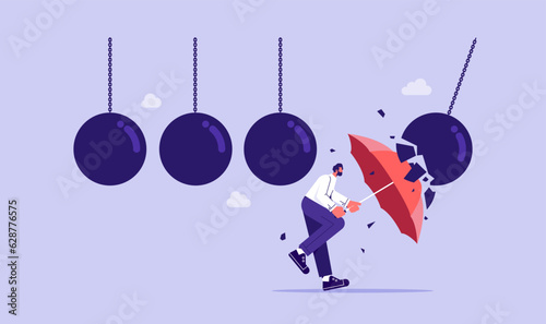stopping domino effect crisis management chain reaction finance intervention conflict prevention concept, Businessman holding umbrella protects from a collision with a broken wrecking ball