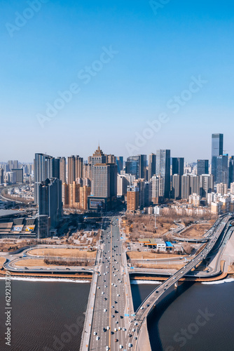 Panoramic view of the CBD city skyline along the Hunhe River in Shenyang, Liaoning, China