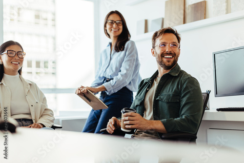 Professionals listening to a discussion in an office