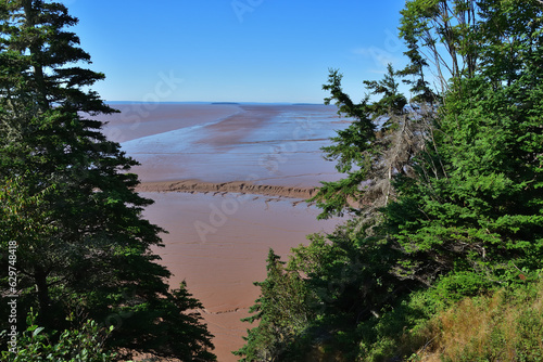 New Brunswick Hopewell Rock area at low tide. Exposed ocean floor mud at low tide.
