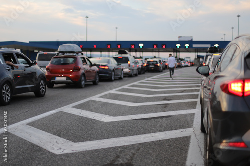 Cars on the road, border checkpoint