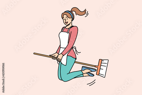 Happy woman flies on mop and smiles, for concept of joy from doing housework and cleaning apartment. Young positive girl housewife or maid sitting astride broom loves to do housework