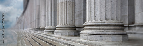 Stone colonnade and stairs detail. Classical pillars row in a building facade