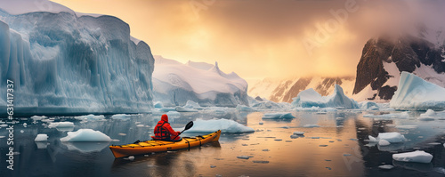Winter kayaking in ice antartica. Frozen sea and glaciers around.