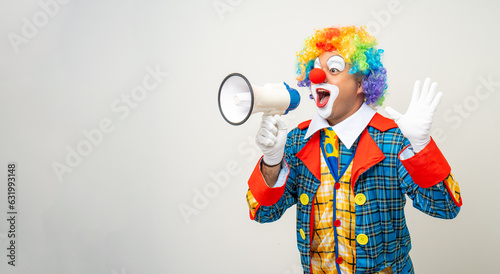 Mr Clown. Funny shocked face comedian Clown man in colorful costume wearing wig shout out loud wow with megaphone mouth announcement. Happy expression amazed bozo in various pose on isolated.