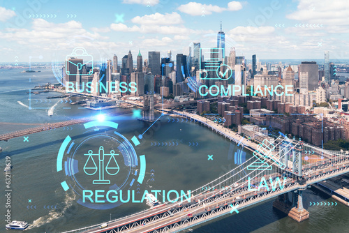 Aerial panoramic city view of Lower Manhattan. Brooklyn and Manhattan bridges over East River, New York, USA. Glowing hologram legal icons. The concept of law, order, regulations and digital justice