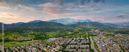 Aerial panorama Colorado Springs neighborhoods by the Rocky Mountains