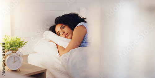 Woman, bed and insomnia or restless for sleep or rest in home bedroom with fatigue or stress. Female person frustrated with sleeping problem, depression or disorder while dreaming or sleepless