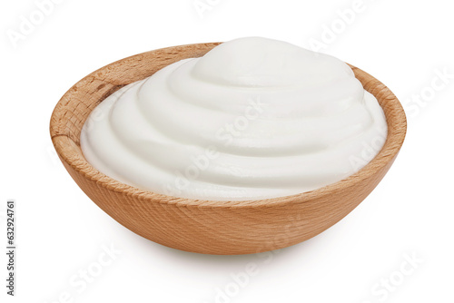 sour cream or yogurt in wooden bowl isolated on white background with full depth of field