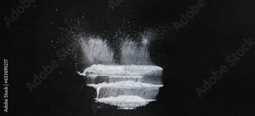 Cocaine on black background. White powder. Drug. 