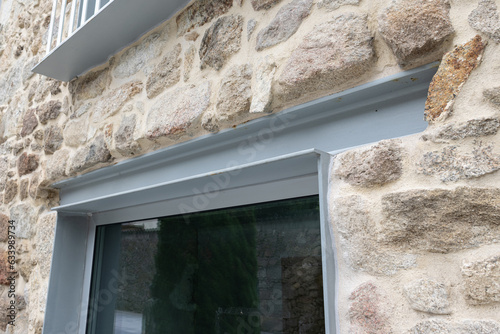 Steel beam lintel of a renovated old house facade. Architecture detail