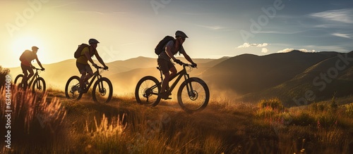 Three friends on electric bicycles enjoying a scenic ride through beautiful mountains