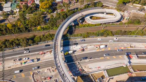Aerial drone view above the newly constructed walkway overpass bridge at Rozelle Interchange construction works in Sydney NSW in August 2023 