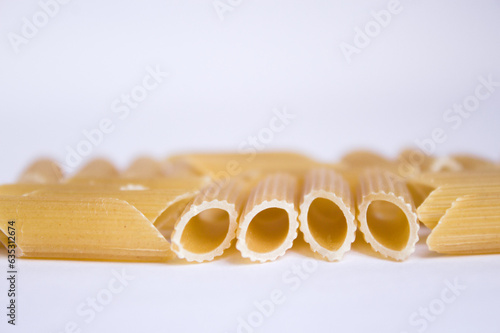 ."Rigatti Noodles: Pure Elegance on White background"