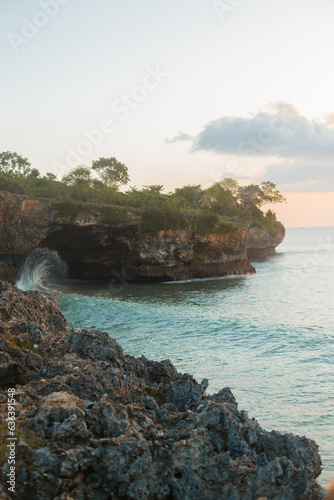 Beautiful rocky shore of the Indian Ocean. View of the rocks and blue waves