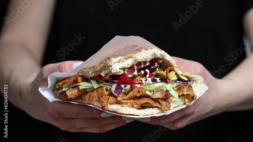 Delicious Berliner doner kebab with fresh turkey and chicken, mixed salad with tomatoes