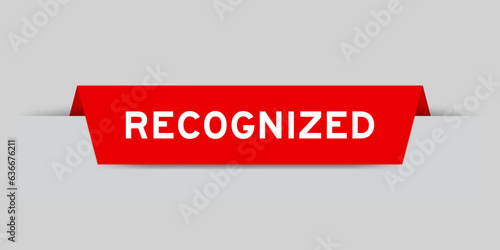 Red color inserted label with word recognized on gray background