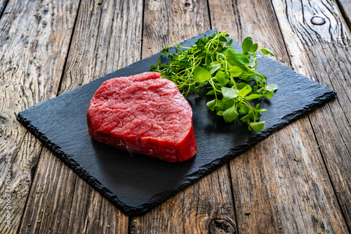 Fresh raw beef meat on cutting board 