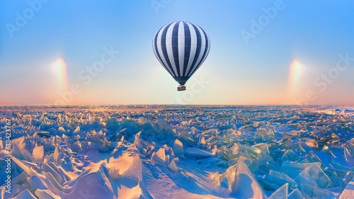 Hot air balloon flying over Baikal lake - Beautiful winter landscape of frozen Lake Baikal at sunrise - Snowy ice hummocks with transparent blue piles of ice - Baikal Lake, Siberia