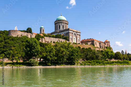 View of the Esztergom Basilica at the Castle Hill from the opposite bank of Danube, Hungary. The Latin motto on the temple frieze reads: Seek those things which are above. It's a World Heritage Site.