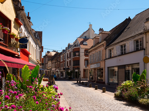 Peaceful streets of Sens, France. Buildings along walkway during daytime.