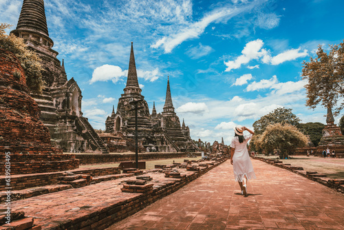Traveler woman travel in Wat Phra Si Sanphet temple at Ayutthaya historical park Thailand