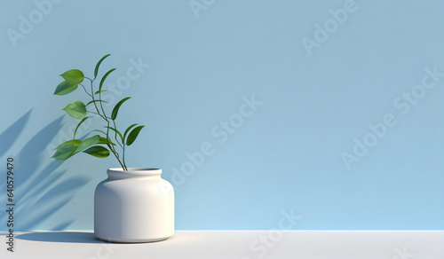 Single branch in a vase on a blue background in a minimalist abstract style