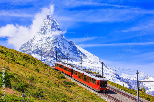 Zermatt, Switzerland. Gornergrat tourist train with Matterhorn mountain in the background. Valais region.