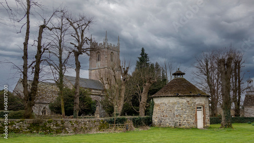 Church and dovecote in an English village. Avebury