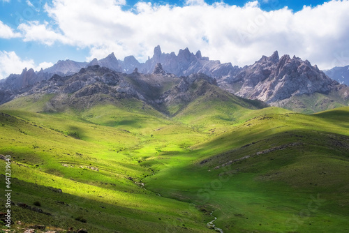 Pointed stone peaks in the dolomite mountains, on a summer day in the Kelinshyktau Mountains, the Karatau massif in the south of Kazakhstan in the Turkestan region
