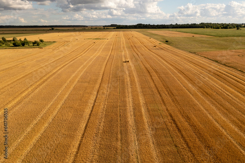 Drone photography of agriculture fields and square hale bales