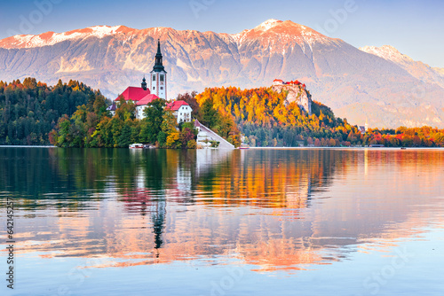 Bled, Slovenia - Julian Alps and Church Santa Maria, beautiful autumn sunset.