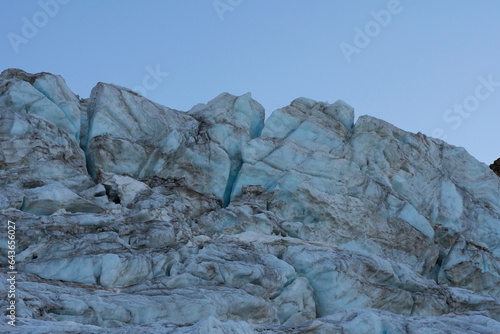 Glacier in the alpine mountains, crevasses and ice details. Gran Paradiso National Park mountaineering. global warming melting the ice.