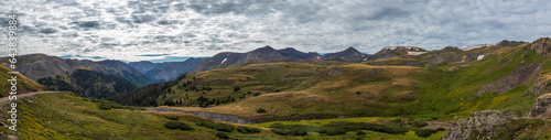 Mountain tundra meadow panorama with overcast morning skies