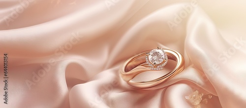 Golden and contemporary diamond rings on isolated pastel background Copy space