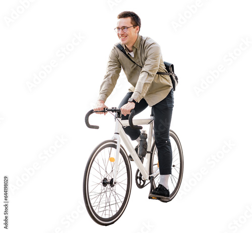 A male cyclist rides a bicycle to the office. Stylish eco transport in the city. A happy man rides a bike.