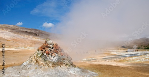 Hot sulfurous gases emerging from fumarole in Iceland