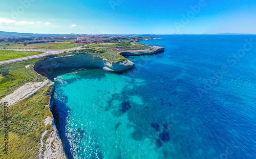 Aerial view of Porto Torres shoreline on a sunny day