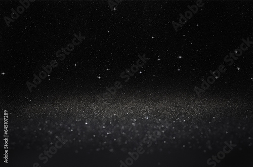 Silver abstract defocused glitter lights on black background, galaxy of lights and stars