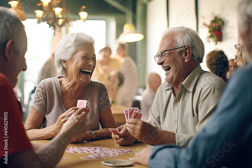seniors in a lively social activity, playing cards and laughing, capturing the joy of leisure in retirement