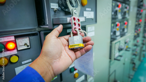 Lockout Tagout or LOTO. A key used to disconnect the energy system to ensure operator safety. Industrial safety concepts