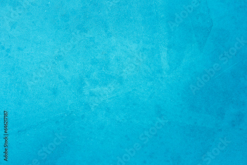 Blue dark concrete texture for background in summer wallpaper. Cement colour and sand wall of tone vintage. Abstract teal dark color. Cement grain texture paint watercolor for design decoration.