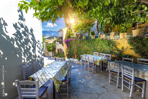 Greece, historic neighborhood of Plaka and Anafiotika in Athens with restaurants near Acropolis.